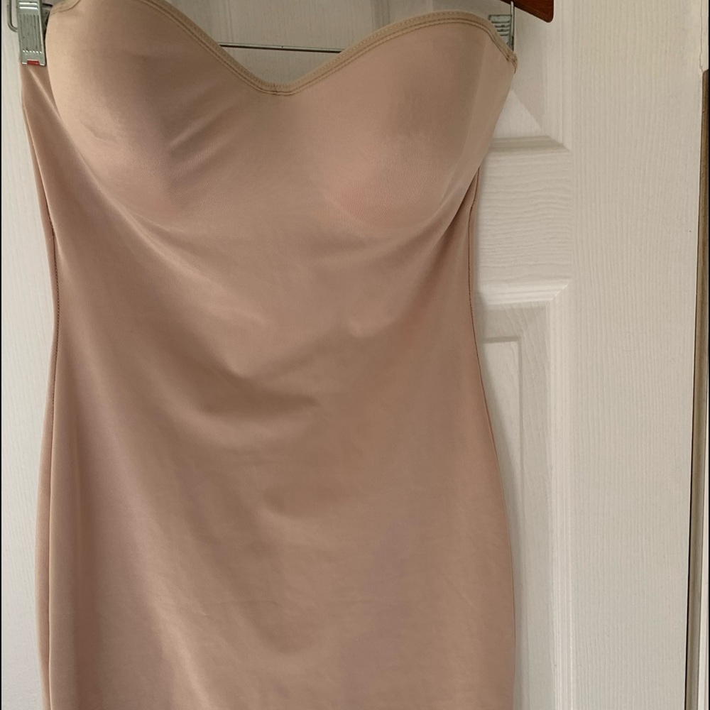 Strapless “bra-slip for smoothing those little budges!